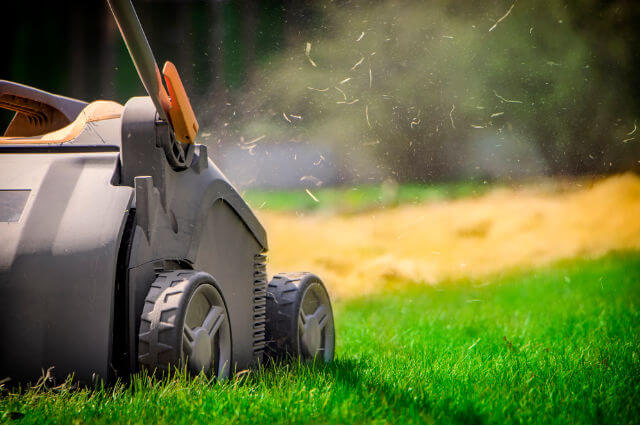 closeup of the back of a lawn aerator.