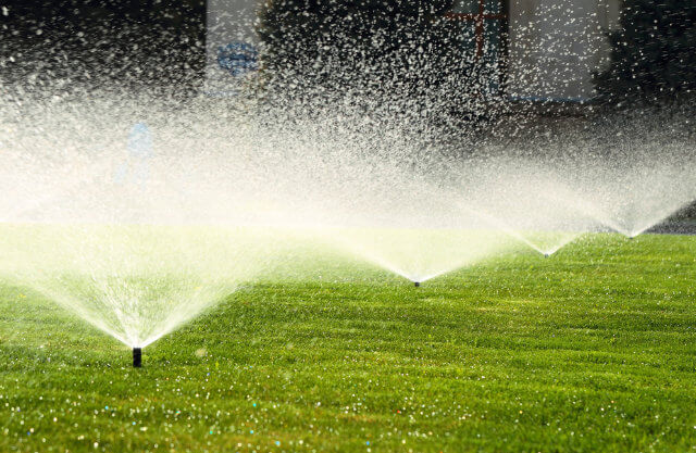 A series of lawn sprinklers.